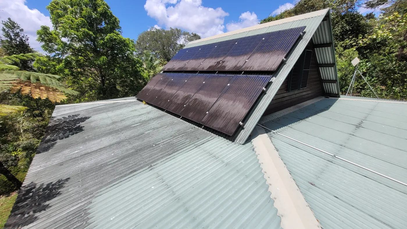 Multi-storey home solar panels before cleaning